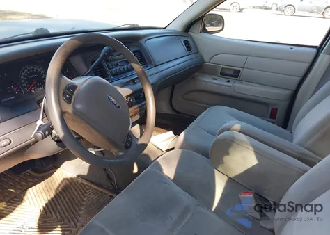 2003 Ford Crown Victoria Police z USA, uszkodzony, nr VIN 2FAFP71W43X178426